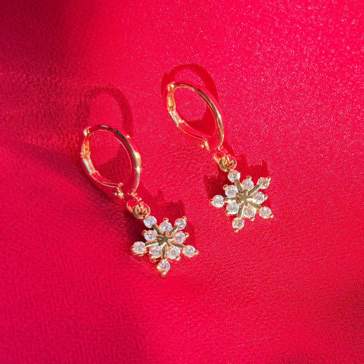 GOLD SNOWFLAKE HOOPS | gold snowflake huggie hoop earrings | holiday jewelry | sparkly Christmas earrings | gold winter earrings