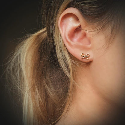 BOWS & SNOWFLAKES STUDS | 18k gold | holiday earrings | dainty bow stud earrings | Christmas earrings | snowflake studs | bow tie earrings