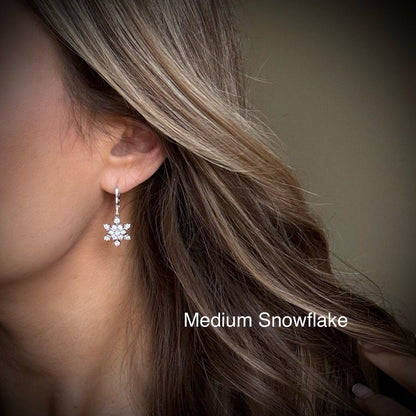 SILVER SNOWFLAKE HUGGIES | silver snow flake hoop earrings | holiday jewelry | sparkly Christmas earrings | chic snowflake hoops | platinum