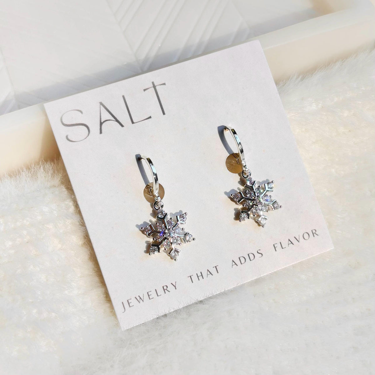 SILVER SNOWFLAKE HUGGIES | silver snow flake hoop earrings | holiday jewelry | sparkly Christmas earrings | chic snowflake hoops | platinum