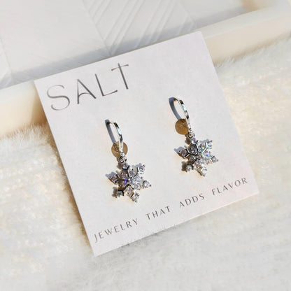 SILVER SNOWFLAKE HUGGIES | silver snow flake hoop earrings | holiday jewelry | sparkly Christmas earrings | chic snowflake hoops | platinum
