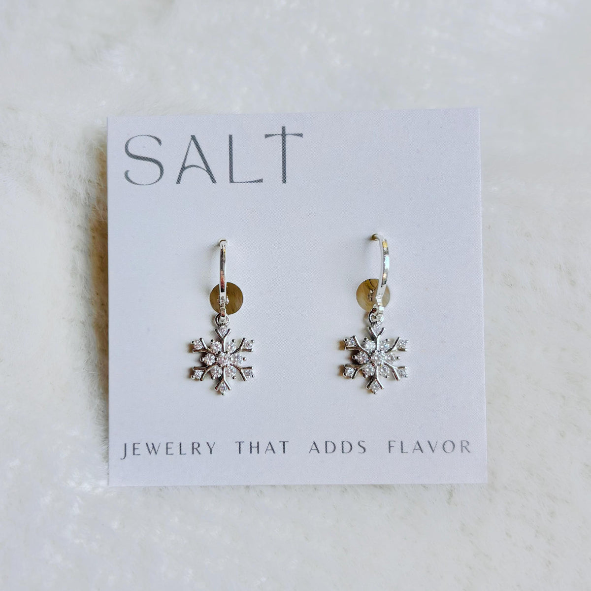 SILVER SNOWFLAKE HUGGIES | silver snow flake hoop earrings | holiday jewelry | sparkly Christmas earrings | chic snowflake hoops | platinum